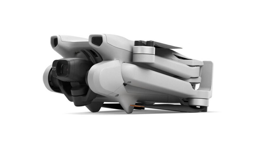 Um compacto Drone Dji Mini 3 Pro com os braços fechados com fundo branco.